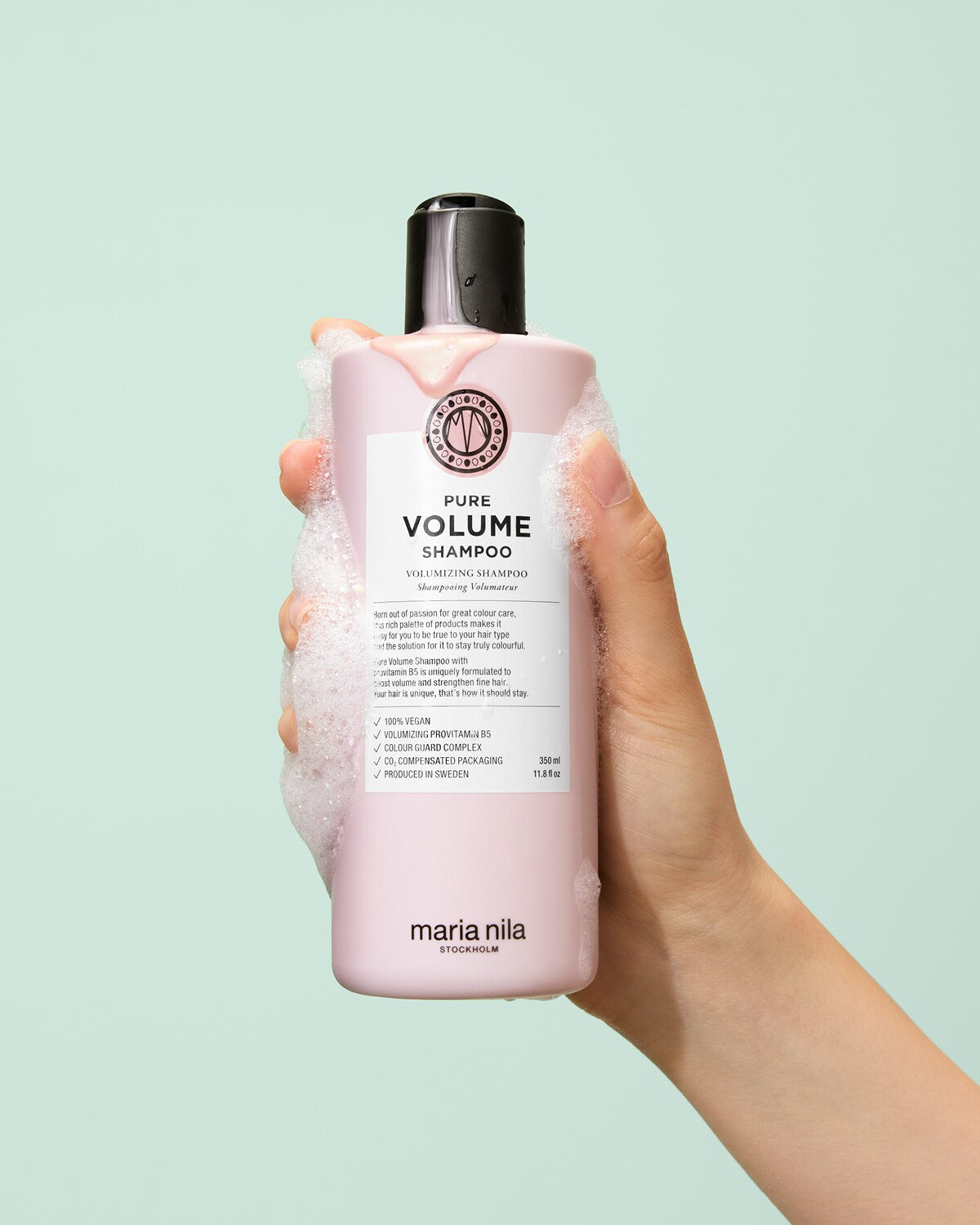 Maria Nila Pure Volume Shampoo bottle with rich lather